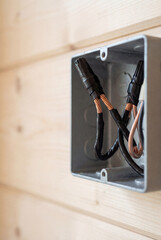 Open Electrical Junction Box with Taped and Insulated Wires on Wood Wall, Home Safety