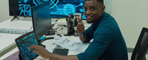 Black engineers are programming in an academic classroom for learning	