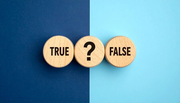 Wooden blocks labeled TRUE, ?, FALSE on blue background