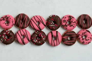 Assorted Pink and Chocolate Donuts with Sprinkles