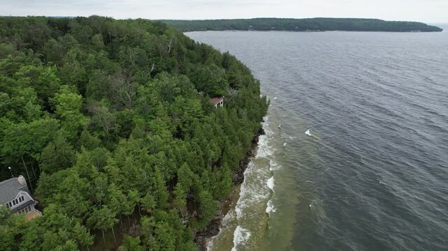 Aerial Drone view of Gill's Rock in Door County Wisconsin.  Sweeping views of bluff over Lake Michigan.