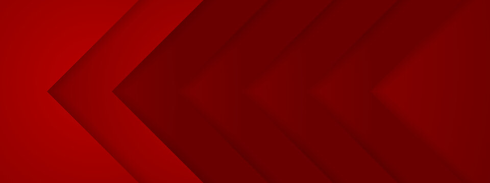 Geometric red background with sharp overlapping arrow shapes creating a sense of direction and depth