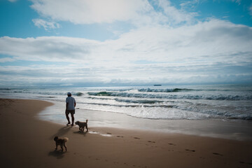 Naklejka premium Woonona Beach north of Wollongong, New South Wales, Australia, with a family friendly sandy shoreline, ocean surf, calm swimming areas and the elevated Woonona Rock Pool, photographed January 3, 2026.
