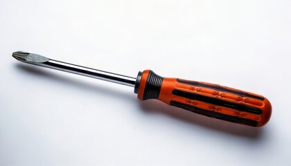 Flathead screwdriver with orange and black handle on white background.