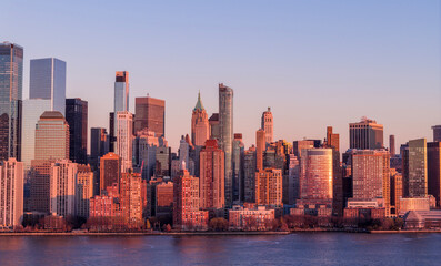 Naklejka premium New York skyline with Tower in panoramic dusk view. NYC panoramic landscape at dusk. New York City wide panoramic skyline at dusk. New York aerial panoramic view of Manhattan skyscrapers.