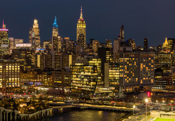 NYC night skyline with Manhattan. New York City aerial view of Manhattan. New York City, Manhattan skyline. New York panoramic cityscape. New York City Hudson skyline. NYC metropolis aerial view.