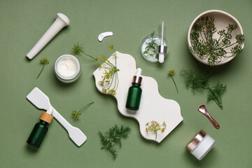 Composition with plaster podium, Petri dish, bottles and jars of dill cosmetic products on green...