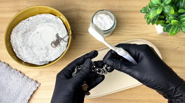 Home care for silver using baking soda and a brush.