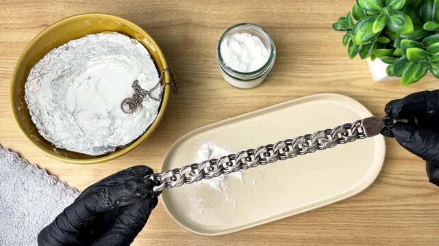 Cleaning silver jewelry with baking soda without harsh chemicals.