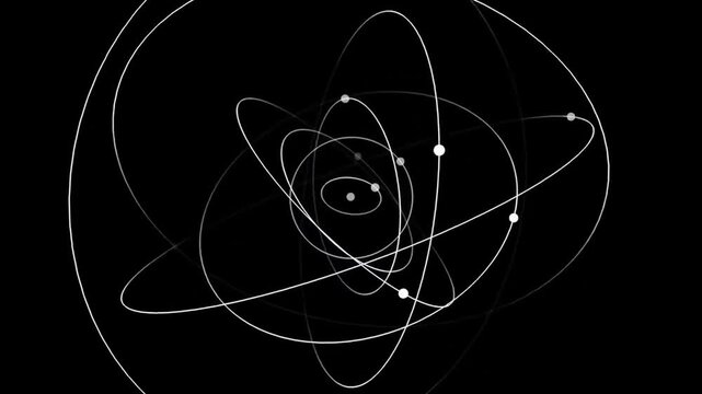 Abstract scientific illustration of subatomic particles orbiting a central nucleus in black and white space.