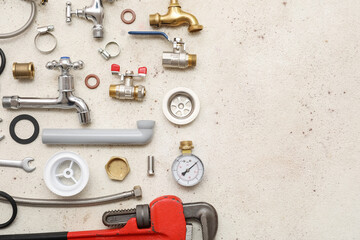 Fototapeta premium Set of plumber's items on white grunge background