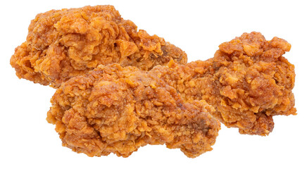 crispy golden brown fried chicken drumsticks and wings on a transparent background, studio shot, delicious fast food.