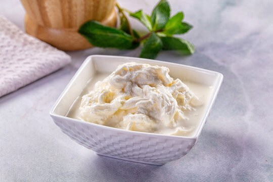 Italian soft young stracciatella cheese