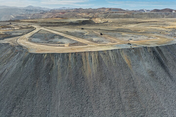 View of slope spills in gigantic mine tailings dumps and waste rock fills