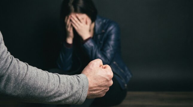 Man threatens woman in domestic abuse situation indoors