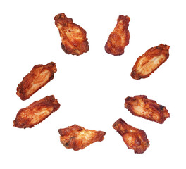 circle of crispy baked chicken wings on a transparent background, appetizing appetizer photography for restaurants and food blogs, delicious snack. © Joy