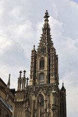 Fototapeta premium The Gothic bell tower of Bern Minster, Switzerland