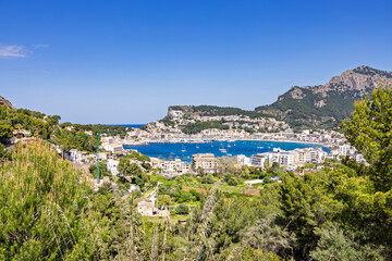 Obraz premium Coast village Port de sóller a famous tourist destination in Mallorca a summer day