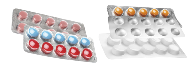 an assortment of colorful pills in blister packs, neatly arranged and overlapping on a clean background.