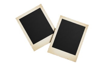 Two blank vintage instant photo frames with aged edges, isolated on transparent background