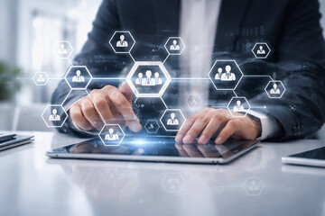 AI generated digital business workspace showing professional using tablet with connected workforce network icons supporting human resource management and enterprise collaboration technology