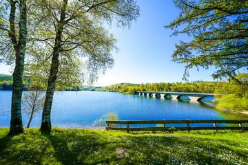 Obraz premium View of the Verse Dam and the surrounding landscape. Nature at the dam in the Märkisches Sauerland region near Lüdenscheid and Herscheid. 