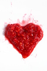 Raspberry Heart on White Background. Symbol of Love and Healthy Eating Concept for Valentine Day.
