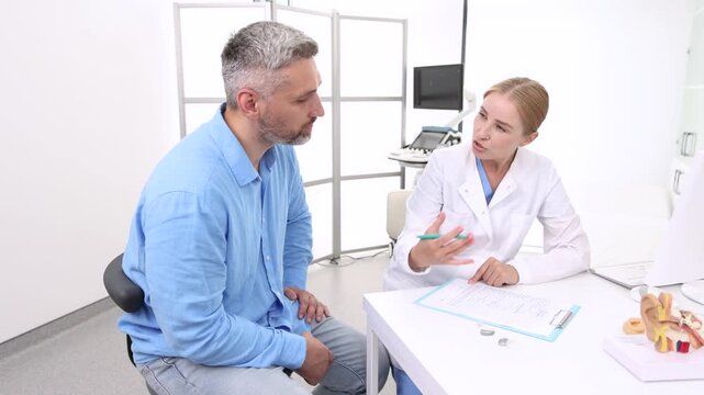 Hearing aids. Behind-the-ear hearing aids are recommended by audioprosthetist to male patient because it is best hearing solutions