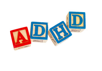 Wooden blocks with the letters ADHD written on it