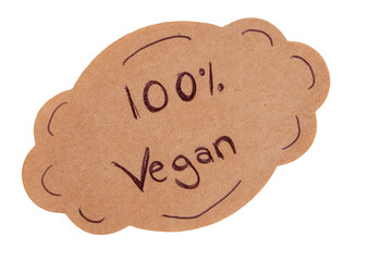 Brown sticker with the words 100% vegan written on it