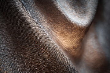 Fototapeta premium An adaptive textile wall made from bio-engineered fibers responding subtly to airflow. Close up of raw textile.