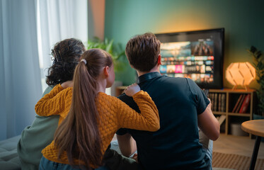 family watching  TV at home