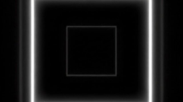 A glowing white square shines brightly on a dark background with no distractions nearby.