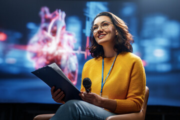woman is giving a presentation at conference
