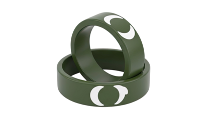 Two green silicone rings with crescent moon symbols