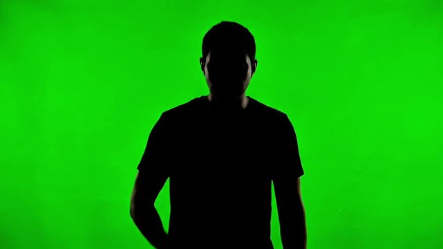 Silhouette person coughing facing forward on green screen background
