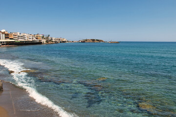 Obraz premium Mediterranean Sea And Rocky Coast Of Crete, Greece 21.06.2023. This was on a hot, Sunny afternoon. Clear turquoise waters of the Mediterranean Sea.