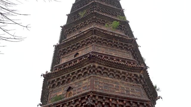 The Kaibao Temple Pagoda in the Iron Tower Park of Kaifeng City, Henan Province, China, was built in 1049 AD. It is the oldest and best-preserved glazed brick pagoda in China.