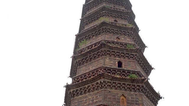 The Kaibao Temple Pagoda in the Iron Tower Park of Kaifeng City, Henan Province, China, was built in 1049 AD. It is the oldest and best-preserved glazed brick pagoda in China.