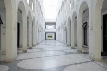 Empty minimalist space with curved wall and ceiling