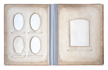 Open vintage photo album with blank decorative frames with different shapes and empty picture windows on aged paper pages