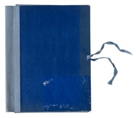 closed blue file folder cover with thread rope binding
