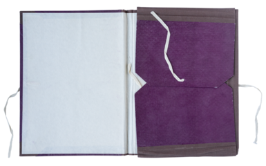 Open vintage purple cloth bound folder with inner paper pocket and string tie on white background
