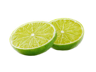 Two vibrant green lime halves, freshly cut, showing juicy flesh on a solid black background
