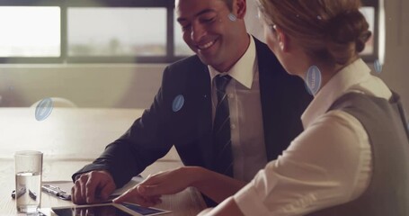 Animation of rugby balls with argentina text over diverse business people talking - Powered by Adobe