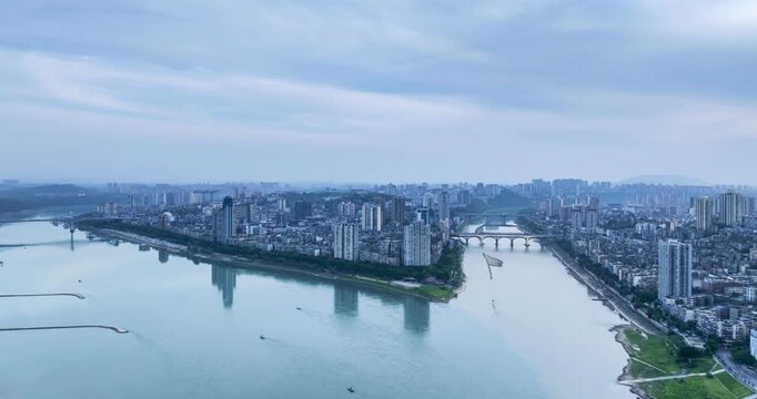 Aerial time-lapse of the Yangtze and Tuojiang rivers converging in Luzhou City, Sichuan Province, China.