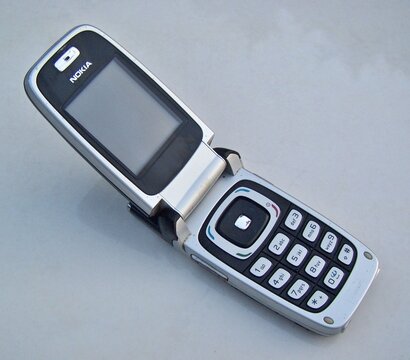 Nokia 2760 flip phone displaying keypad and screen