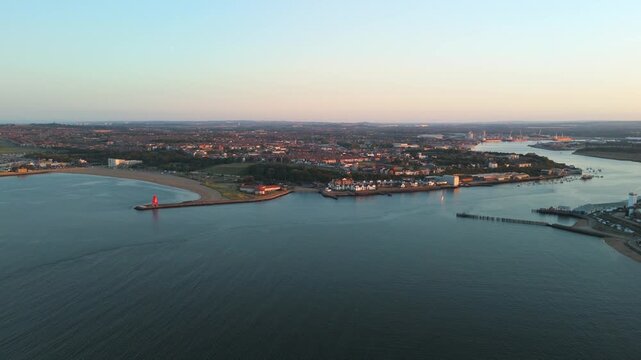 Tynemouth UK: 16th Aug 2025: Beautiful sunset view of South Shields and North Shields, Tynemouth along the River Tyne with calm waters and shipping heritage