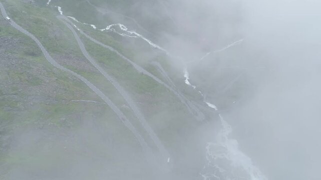 Cinematic of Trollstigen Norway with 11 serpentines and steep mountain cliffs
