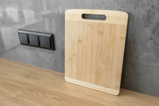 Modern electrical anthracite power socket and plug switched waterproof with cover.
